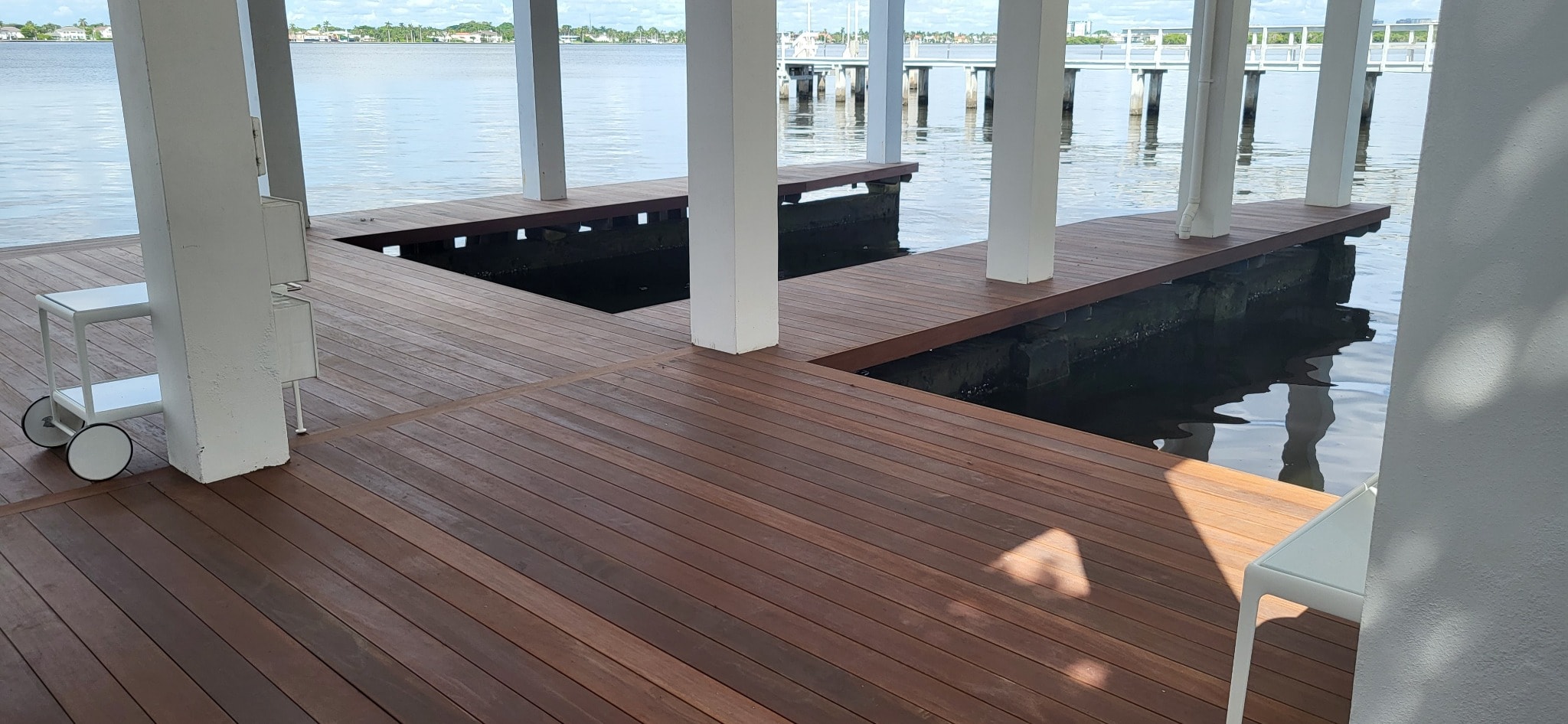 Hardwood deck built around structural columns