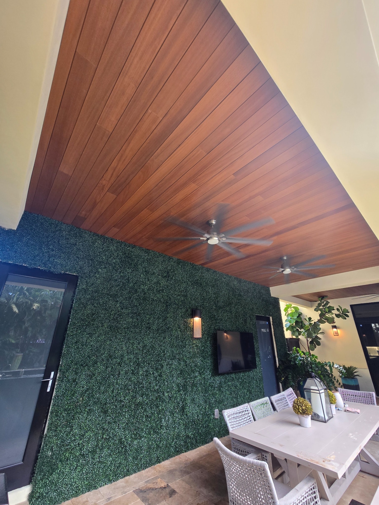 Hardwood ceiling over outdoor dining area